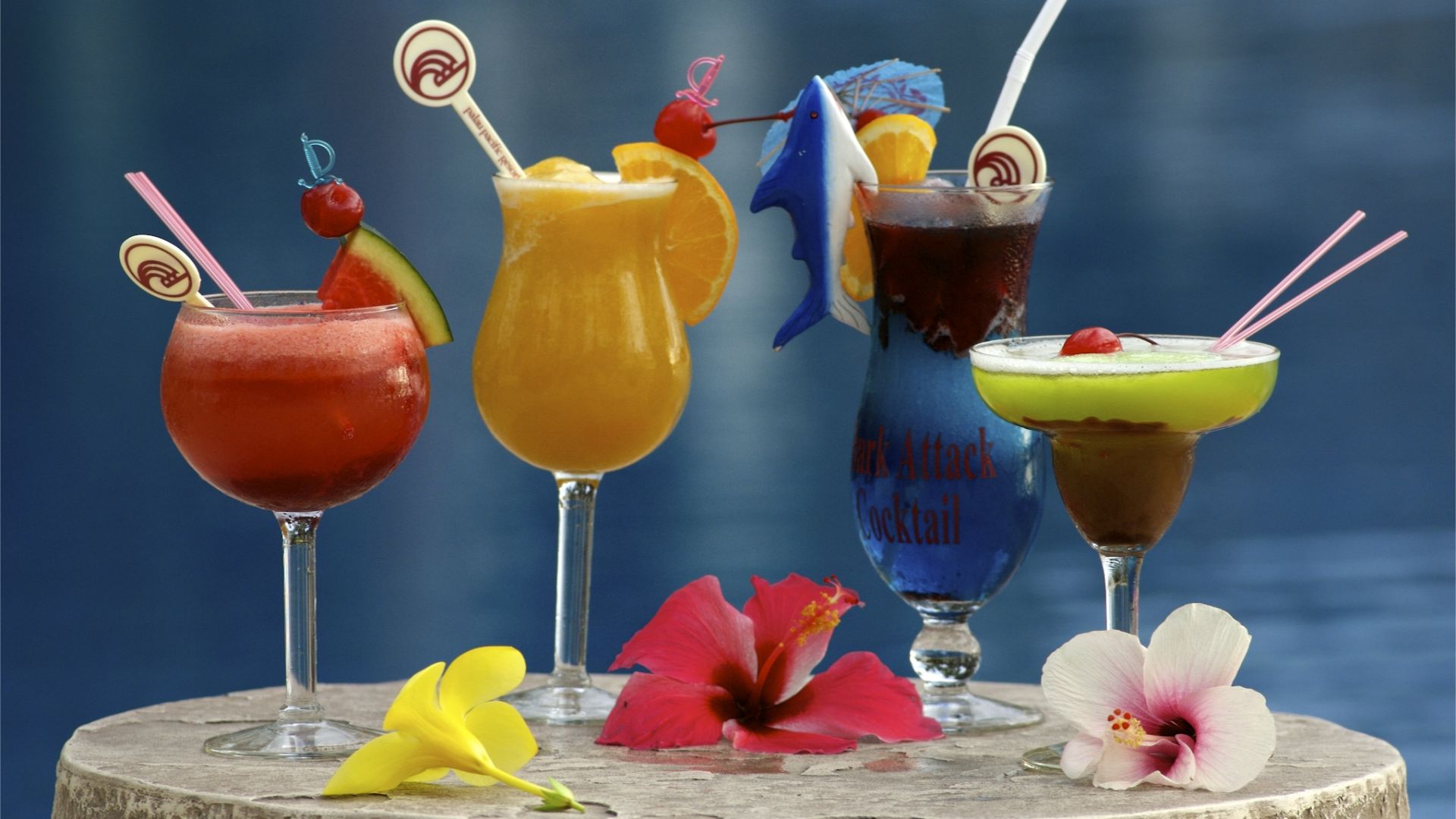 A Group Of Colorful Drinks